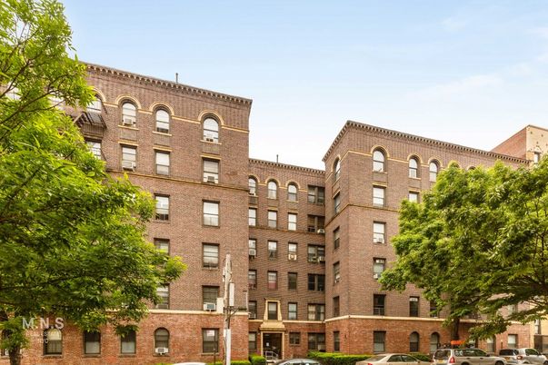 Exterior, Facade, Brick Facade, Condo Building