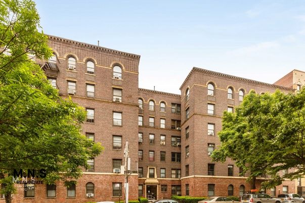 Exterior, Facade, Brick Facade, Condo Building