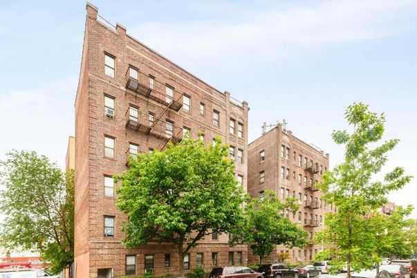 Exterior, Facade, Brick Facade, Condo Building