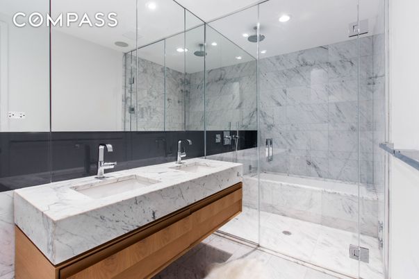 Bathroom, Dual Sink Vanities, Glass Shower, Interior, Marble, Marble Walls, Recessed Lighting