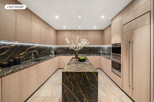 Interior, Kitchen, Marble Walls, Recessed Lighting, Stainless Steel Appliances, Wood Texture Flooring