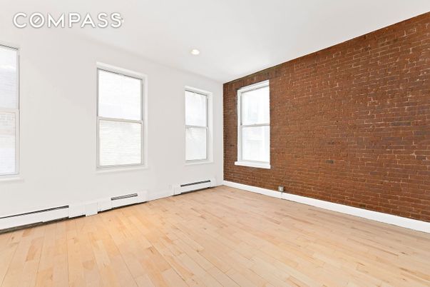 Empty room, Interior, Recessed Lighting, Stone Walls, Wood Texture Flooring