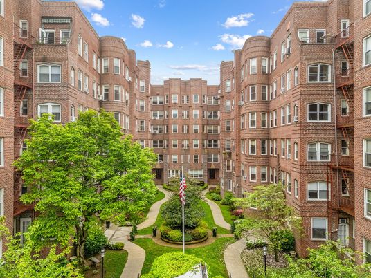 Exterior, Facade, Brick Facade, Condo Building
