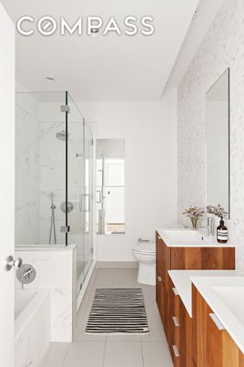 Bathroom, Dual Sink Vanities, Glass Shower, Interior, Marble Walls, Recessed Lighting