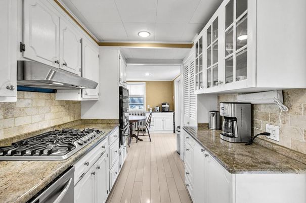 Dining room, Interior, Kitchen, Recessed Lighting, Stainless Steel Appliances, Wood Texture Flooring