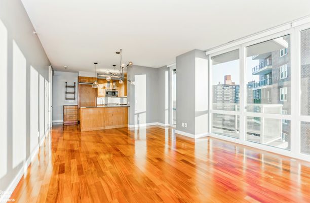 Empty room, Interior, Kitchen, Pendant Lights, Stainless Steel Appliances, Wood Texture Flooring
