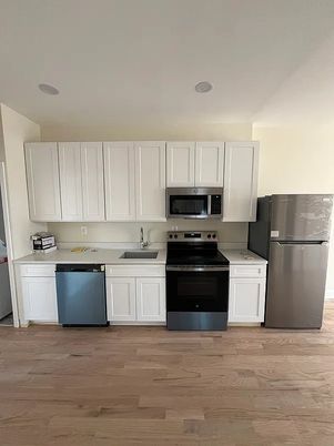 Interior, Kitchen, Recessed Lighting, Stainless Steel Appliances, Wood Texture Flooring