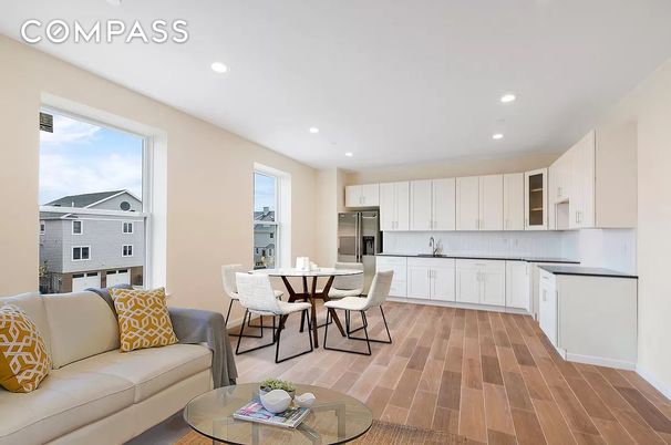 Dining room, Interior, Kitchen, Living room, Recessed Lighting, Stainless Steel Appliances, Wood Texture Flooring
