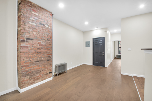 Empty room, Interior, Recessed Lighting, Stone Walls, Wood Texture Flooring