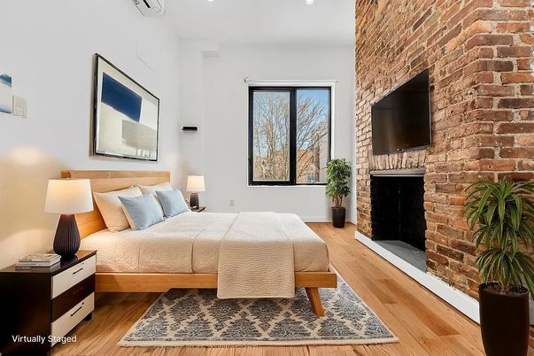 Bedroom, Fireplace, Interior, Recessed Lighting, Stone Walls, Wood Texture Flooring