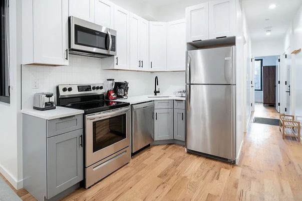 Interior, Kitchen, Recessed Lighting, Stainless Steel Appliances, Wood Texture Flooring