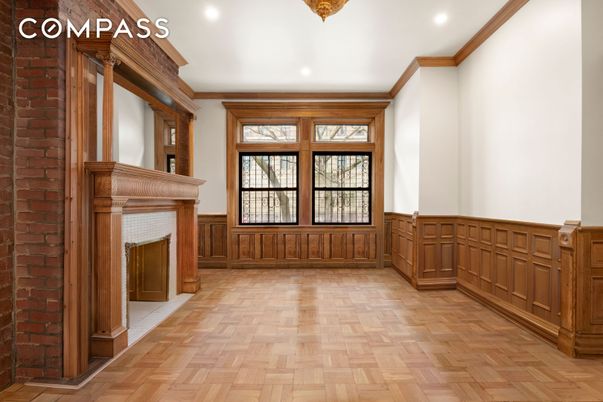Empty room, Fireplace, Interior, Recessed Lighting, Stone Walls, Wood Texture Flooring