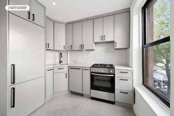 Interior, Kitchen, Marble Walls, Recessed Lighting, Stainless Steel Appliances