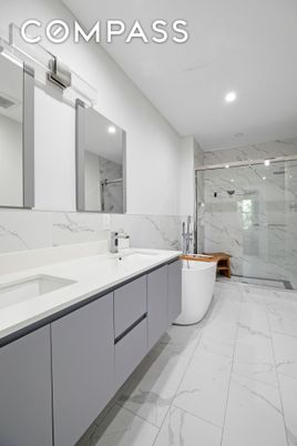 Bathroom, Dual Sink Vanities, Free Standing Baths, Glass Shower, Interior, Marble, Marble Walls, Recessed Lighting