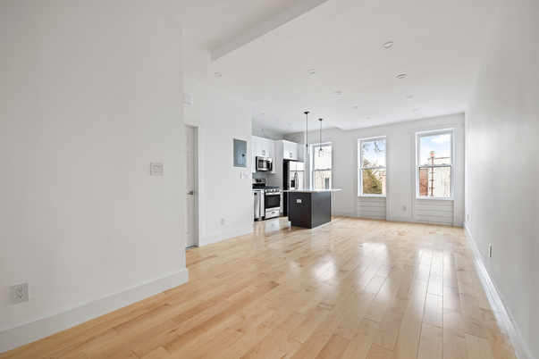 Empty room, Interior, Kitchen, Pendant Lights, Recessed Lighting, Stainless Steel Appliances, Wood Texture Flooring