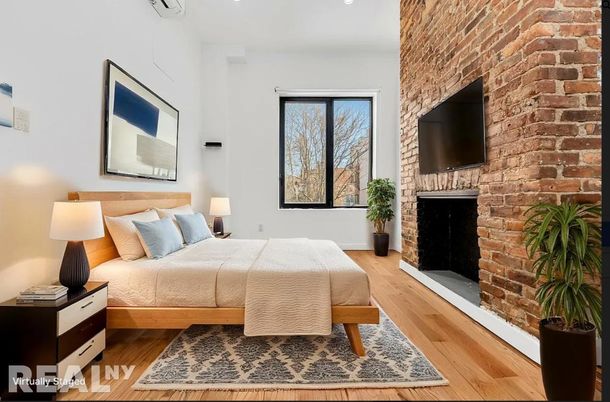 Bedroom, Fireplace, Interior, Recessed Lighting, Stone Walls, Wood Texture Flooring