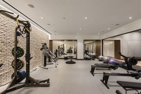 Fitness Equipment, Gym, Interior, Recessed Lighting, Stone Walls, Wood Texture Flooring