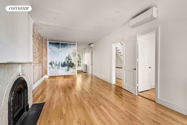 Fireplace, Interior, Recessed Lighting, Washer, Wood Texture Flooring