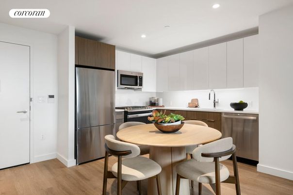 Dining room, Interior, Kitchen, Recessed Lighting, Stainless Steel Appliances, Wood Texture Flooring