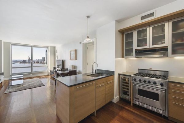 Dining room, Interior, Kitchen, Pendant Lights, Stainless Steel Appliances, Water, Wood Texture Flooring