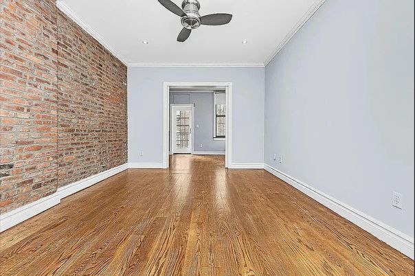 Empty room, Interior, Recessed Lighting, Stone Walls, Wood Texture Flooring