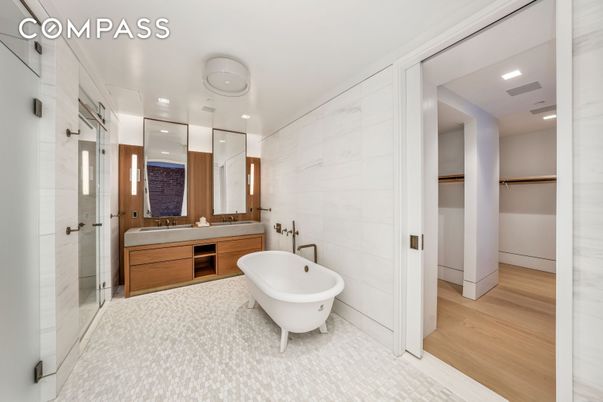 Bathroom, Dual Sink Vanities, Free Standing Baths, Glass Shower, Interior, Recessed Lighting, Wood Texture Flooring