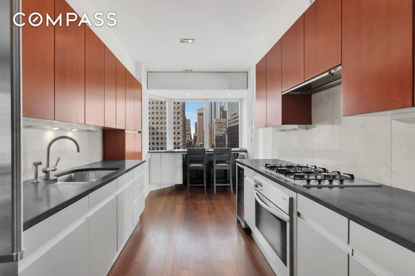 Dining room, Interior, Kitchen, Recessed Lighting, Stainless Steel Appliances, Wood Texture Flooring