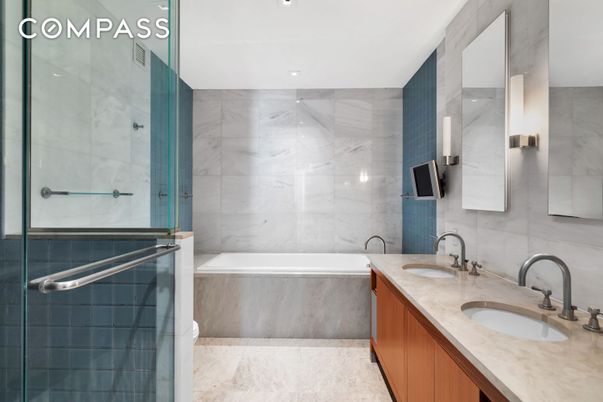 Bathroom, Dual Sink Vanities, Glass Shower, Interior, Marble Walls, Recessed Lighting