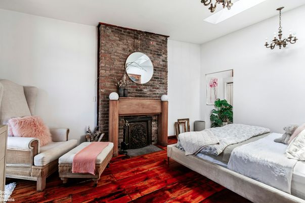 Bedroom, Chandelier, Fireplace, Interior, Stone Walls, Wood Texture Flooring