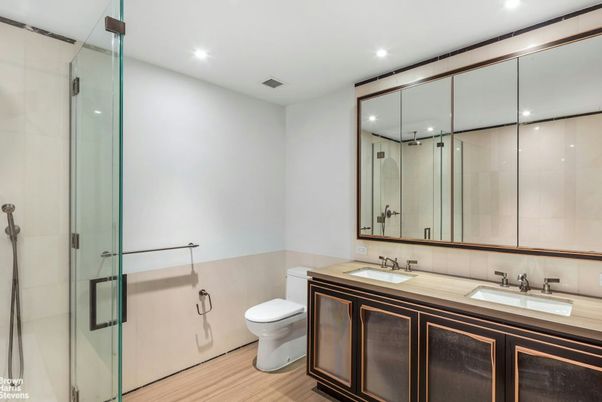 Bathroom, Dual Sink Vanities, Glass Shower, Interior, Recessed Lighting, Wood Texture Flooring