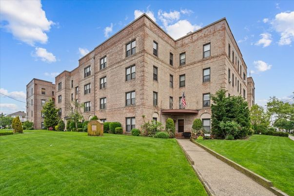 Backyard, Exterior, Facade, Brick Facade, Condo Building