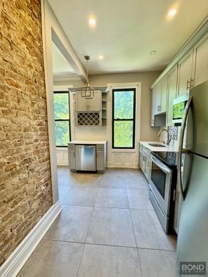 Interior, Kitchen, Pendant Lights, Recessed Lighting, Stainless Steel Appliances, Stone Walls