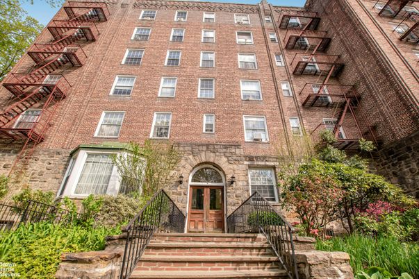 Exterior, Facade, Brick Facade, Condo Building