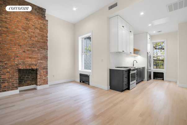 Fireplace, Interior, Kitchen, Recessed Lighting, Stone Walls, Wood Texture Flooring