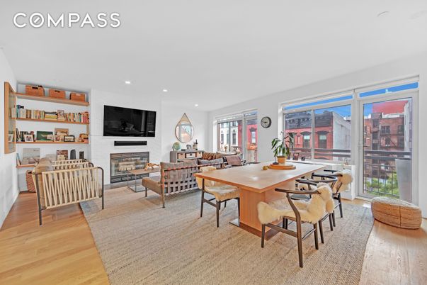 Dining room, Fireplace, Interior, Living room, Recessed Lighting, Wood Texture Flooring