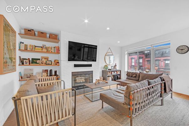 Dining room, Fireplace, Interior, Living room, Recessed Lighting, Wood Texture Flooring