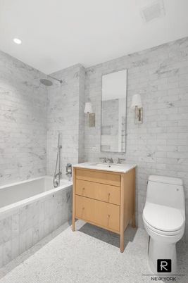 Bathroom, Dual Sink Vanities, Interior, Marble Walls, Recessed Lighting