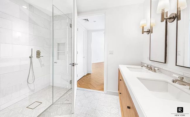 Bathroom, Dual Sink Vanities, Glass Shower, Interior, Marble Walls, Wood Texture Flooring