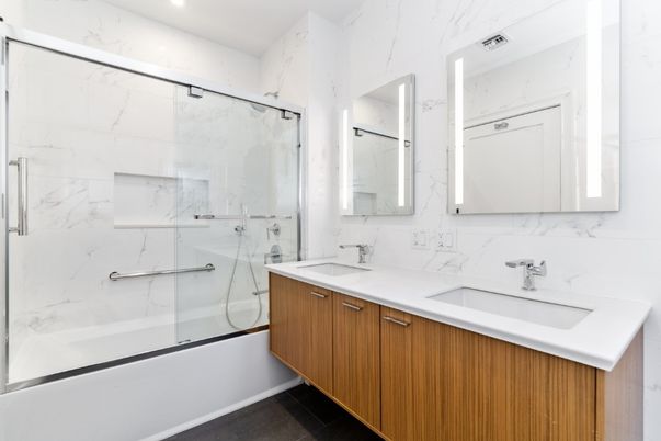 Bathroom, Dual Sink Vanities, Glass Shower, Interior, Marble Walls, Recessed Lighting