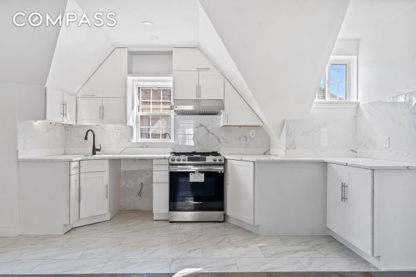 Interior, Kitchen, Marble, Marble Walls, Recessed Lighting, Stainless Steel Appliances