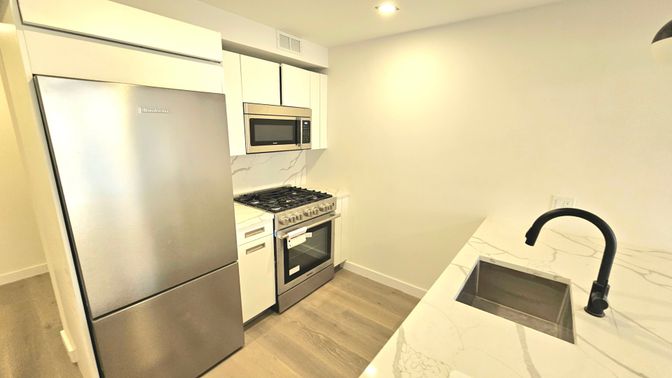 Interior, Kitchen, Recessed Lighting, Stainless Steel Appliances, Wood Texture Flooring