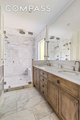 Bathroom, Dual Sink Vanities, Glass Shower, Interior, Marble, Marble Walls, Recessed Lighting