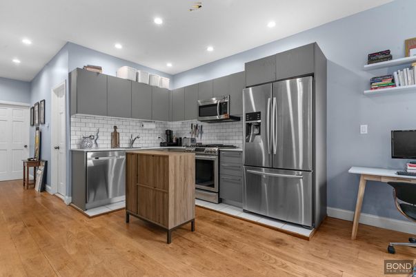 Interior, Kitchen, Recessed Lighting, Stainless Steel Appliances, Wood Texture Flooring
