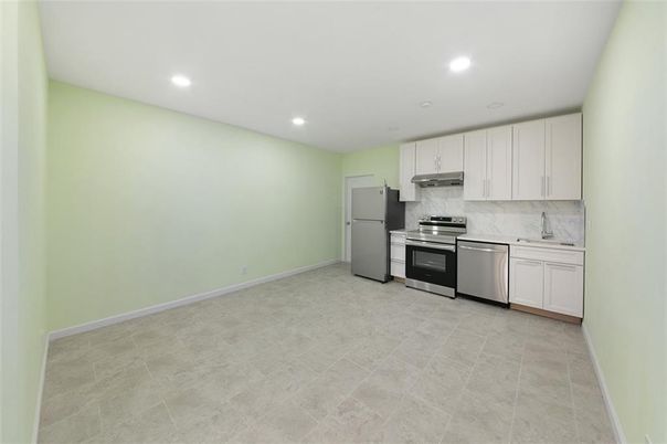 Interior, Kitchen, Marble Walls, Recessed Lighting, Stainless Steel Appliances