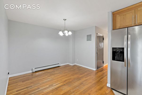 Empty room, Interior, Kitchen, Pendant Lights, Stainless Steel Appliances, Wood Texture Flooring