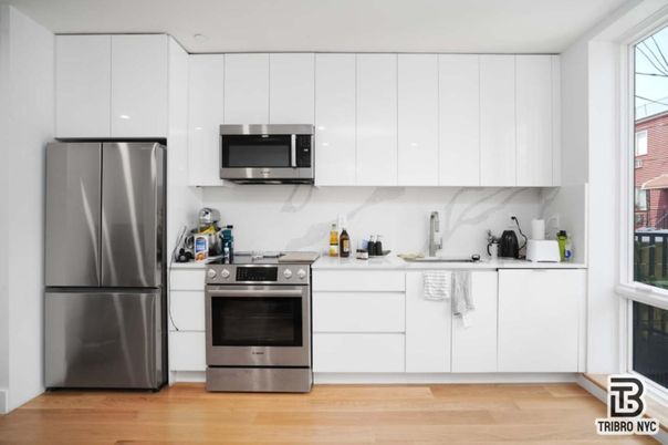 Interior, Kitchen, Marble Walls, Stainless Steel Appliances, Wood Texture Flooring