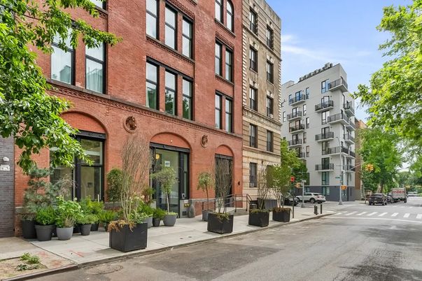 Exterior, Facade, Brick Facade, Condo Building