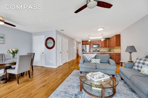 Dining room, Interior, Kitchen, Living room, Recessed Lighting, Stainless Steel Appliances, Wood Texture Flooring