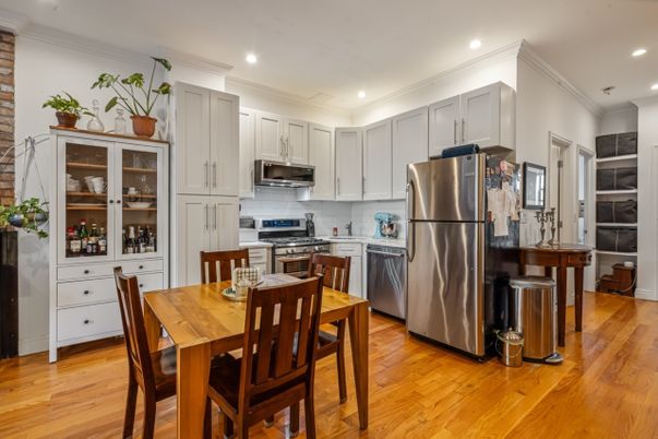 Dining room, Interior, Kitchen, Recessed Lighting, Stainless Steel Appliances, Wood Texture Flooring