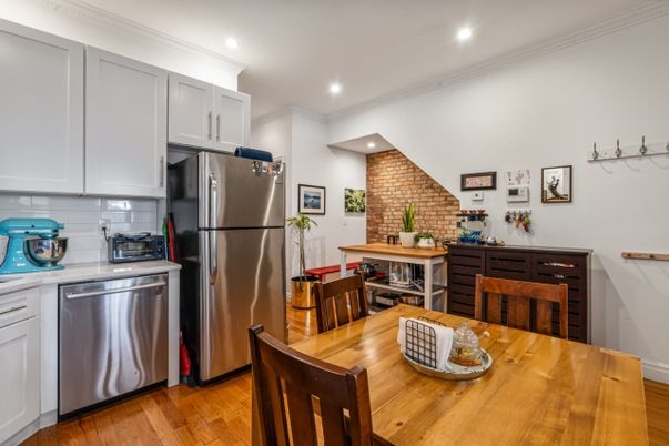 Dining room, Interior, Kitchen, Recessed Lighting, Stainless Steel Appliances, Stone Walls, Wood Texture Flooring